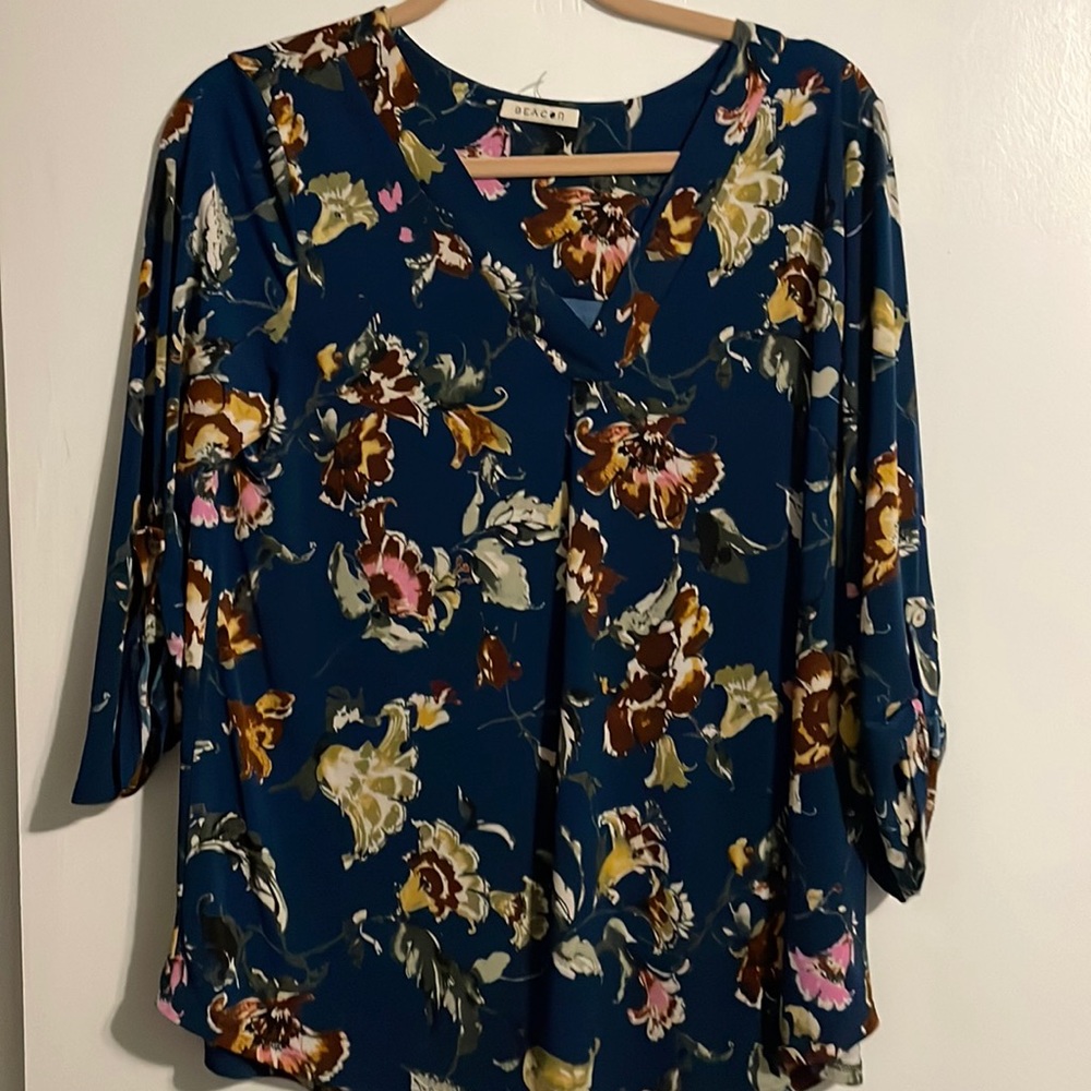 Three quarter sleeve shirt with floral design